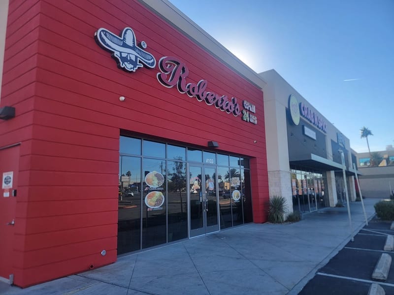 Roberto's restaurant storefront with bold red painted exterior