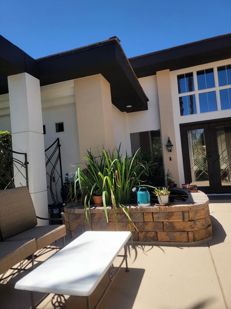 Exterior repaint by Mark Anthony Painting — courtyard entry with columns, Las Vegas NV