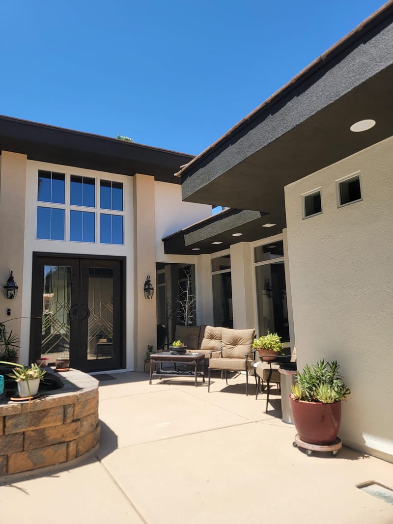 Exterior repaint by Mark Anthony Painting — covered patio courtyard with columns and seating, Las Vegas NV